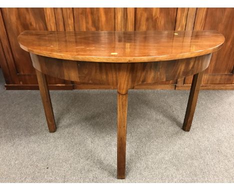 A George III mahogany d-shaped console table, width 111.5 cm. 