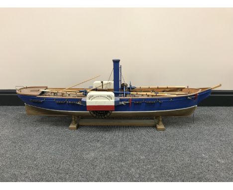 A scratch-built model - Paddle steamer, on stand,  length 110 cm.