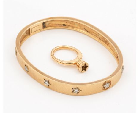 "Love"-Armreif im Stil von CartierRoségold, 18 k. Ovaler, umlaufend satinierter Armreif schauseitig besetzt mit 11 sternförmi