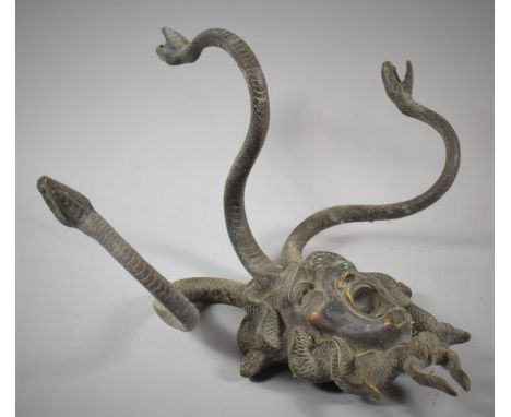 A Modern Cast Metal Bronze Effect Wall Hanging or Coat Rack in the Form of Medusa's Head with Three Snakes, 30cm high 