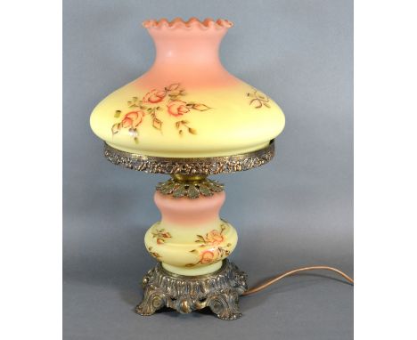 A Gilt Metal And Opaque Glass Oil Lamp with opaque glass shade decorated with roses converted to electricity 