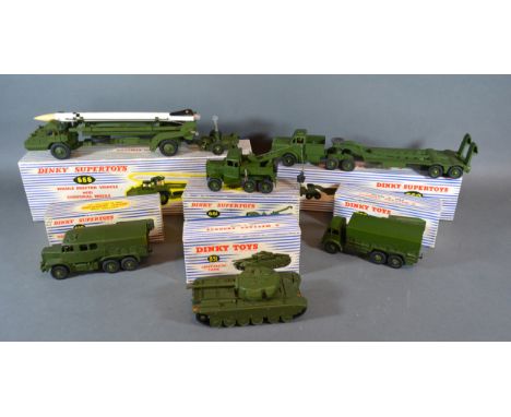 A Dinky Supertoys 666 Missile Erector Vehicle with original box together with another similar Tank Transporter No.660, anothe
