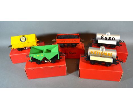 A Hornby Trains 0 Gauge Cement Wagon within original box together with a coal wagon, a hopper wagon, a No.1 petrol tank wagon