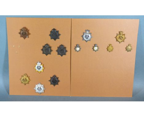 A Collection Of Army Service Corps Cap Badges 