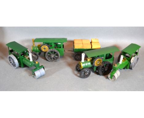 A Triang Minic Toys Tinplate Clockwork Traction Engine with Trailer together with three other Minic Tinplate Traction Engines