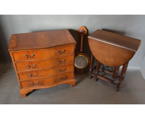 A Serpentine Fronted Chest Of Drawers, the moulded top above four drawers with brass drop handles raised upon bracket feet, 7