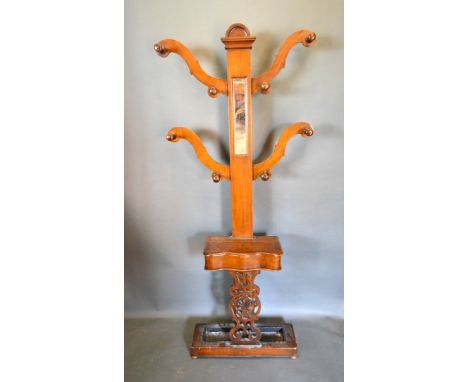 A Victorian Mahogany Hall Stand with Shaped Arms above a glove compartment and stick stand 