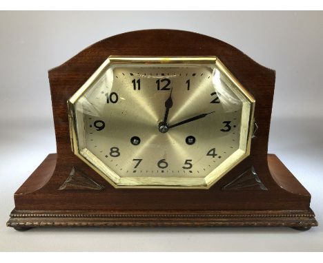 German mantle clock with octagonal bezel in mahogany case, approx 22cm in height