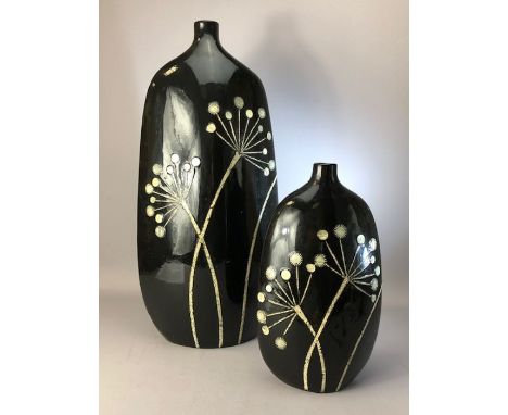Two modern black ceramic vases, the tallest approx 58cm in height