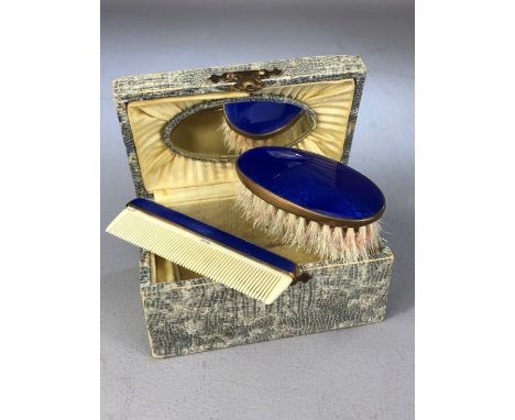 Boxed travel set of Brush and comb set with Blue enamel detaing and Brass frames, box (approx 11 x 7 x 5cm) with small oval m