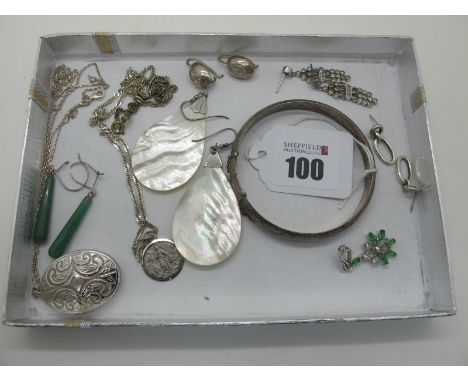 An Oval Locket Pendant, on a chain (stamped "925"), a St.Christopher pendant (stamped "800") on a chain, a hinged bangle, wit