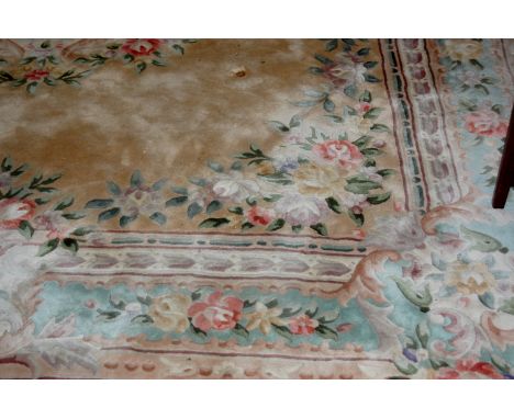 A large modern Chinese superwash floral ground carpet, 390 x 277cm