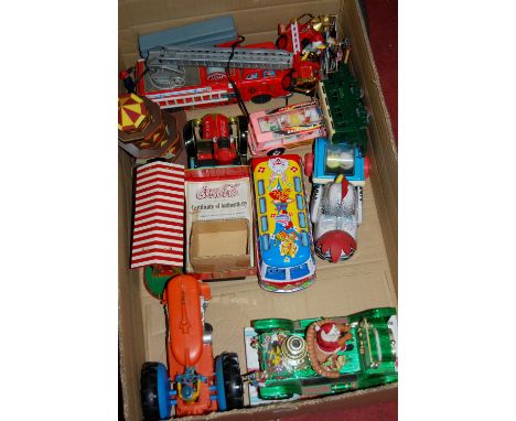 Box of tinplate toys to include Hachette collection French SNCF locomotive, large scale plastic tractor, Coca Cola limited ed