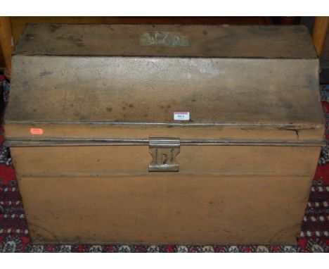 A late 19th century painted metal hinged top travelling trunk 