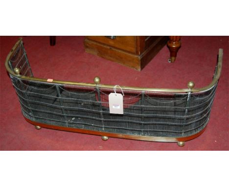 A Victorian brass low nursery mesh fender