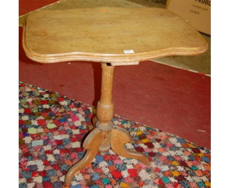 A Victorian light oak fixed top pedestal occasional table 