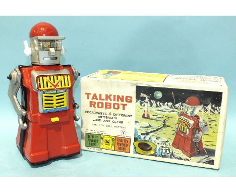 A Yonezawa (Japan) battery-operated Talking Robot with red tinplate body, silver head and arms, white plastic ears and lithog