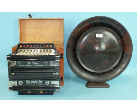 An Art Deco Philips brown Bakelite 'Pancake' speaker with metal triangular foot, 40cm diameter, 43cm high overall, together w