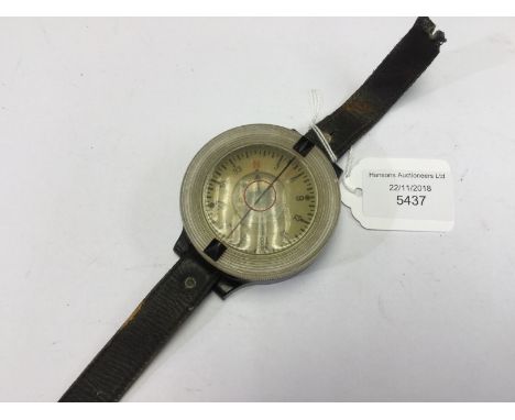 WW2 Third Reich Luftwaffe Armbandkompass Wrist Compass. Marked "FL 23235". Maker marked and dated "AK39". Clear lid to dial w