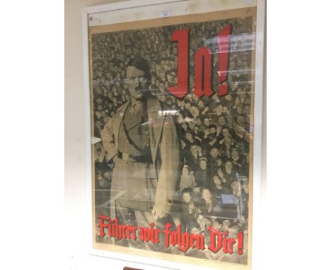 WW2 Third Reich. 1934 Nazi propaganda poster showing portrait of Adolf Hitler standing firmly before a jubilant and optimisti