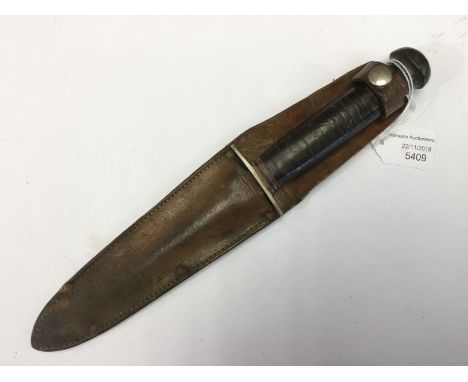 WW2 British private purchase knife by William Rogers of Sheffield. 14cm long double edged blade. Leather grip made from multi
