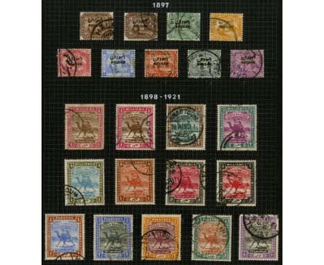 Sudan. 1897-1954 used collection on black leaves. The 1897 set are nearly all faked, Gordon 20p and 50p with faked cancels, a