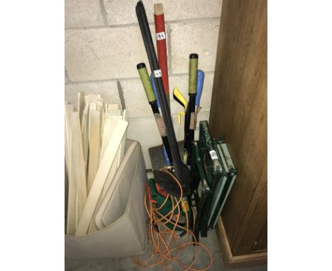 A hedge cutter and other garden items