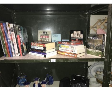 A shelf of war related books