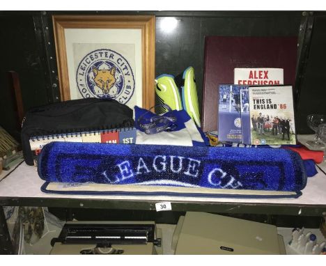 A shelf of football related items, mainly Leicester City
