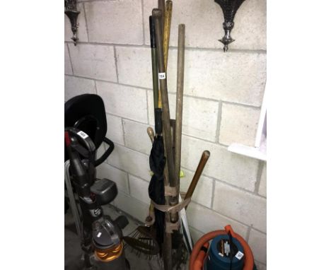 A quantity of garden tools etc.