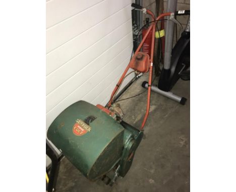 A Suffolk Super Colt petrol engine lawn mower