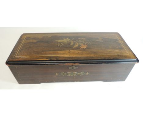 A 19th Century crank wound cylinder musical box, number 25617, the 28cms cylinder playing eight airs, with inner glass panel 