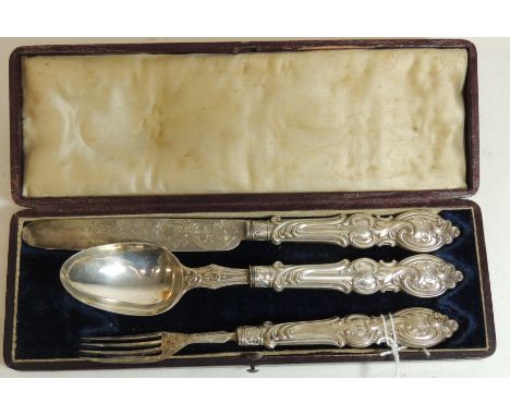 A Victorian cased silver Christening set, hallmarked for Sheffield 1869, and comprising knife, fork and spoon, with initialed