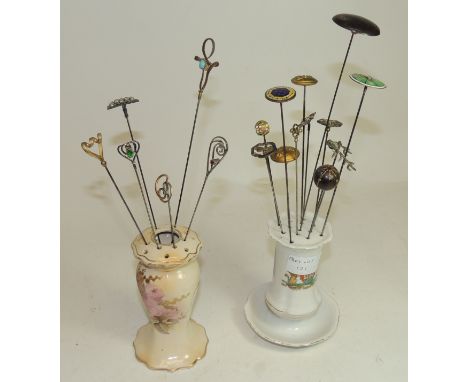 A group of eighteen assorted hat pins including a tortoiseshell pique ball; "Machine Gun Corp" button, Venetian glass ball, e