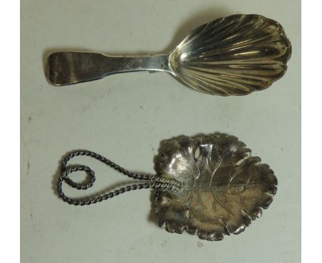 A silver, William IV caddy spoon, hallmarked for London 1836 with shell bowl and another Victorian silver caddy spoon with tw