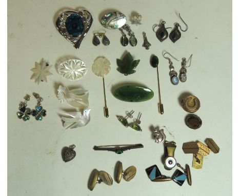 A silver squirrel lapel stud; various silver and silver metal earrings; pendants; jade set brooch and stick pin; paua shell j
