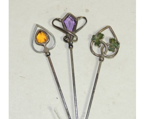 A silver finial "Charles Horner" Art Nouveau hat pin enamelled with two clover leaves, hallmarked Chester 1904; another "Char