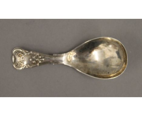A silver caddy spoon 