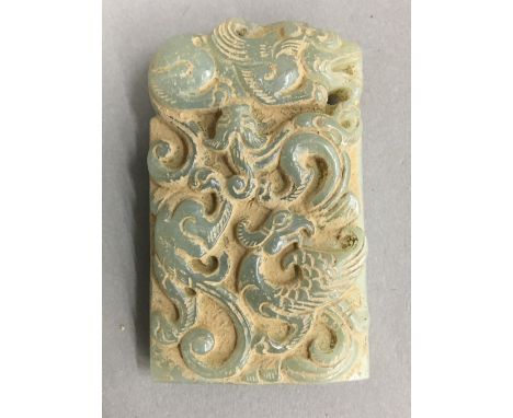 A carved jade rectangular pendant