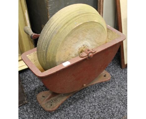A hand operated grindstone, an usual toaster and a barometer