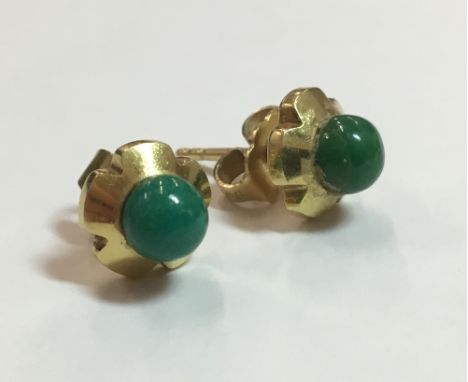 A pair of 18 ct gold jade set stud earrings, boxed