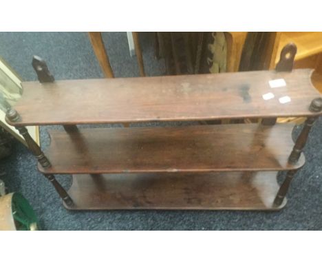 A Victorian stained pine hanging shelf. 84 cm wide; 60 cm high; 16 cm deep.