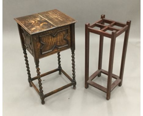 An oak stick stand and an early 20th century oak barley twist sewing table