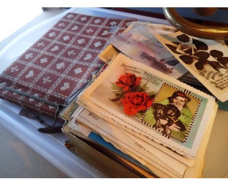 Collection of vintage postcards and photographs