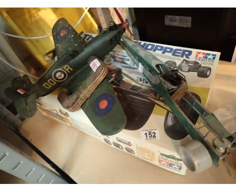 Collection of vintage toys including petrol engine control line aircraft 