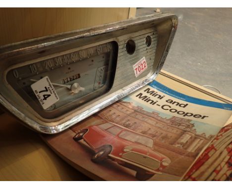Vintage Ford Anglia dash board speedometer and a Mini and Mini Cooper booklet 