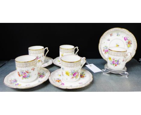 A set of six Dresden porcelain floral patterned and gilt edged cups and saucers, (6) 