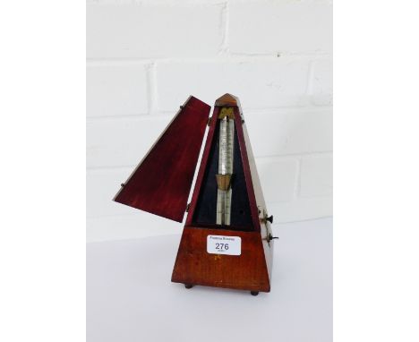 A Maelzel mahogany cased metronome, 23cm high