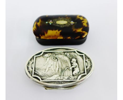 Norwegian white metal snuff box, the oval hinged lid with repousee pattern of 'Sommer', 7.5cm long together with a horn and t