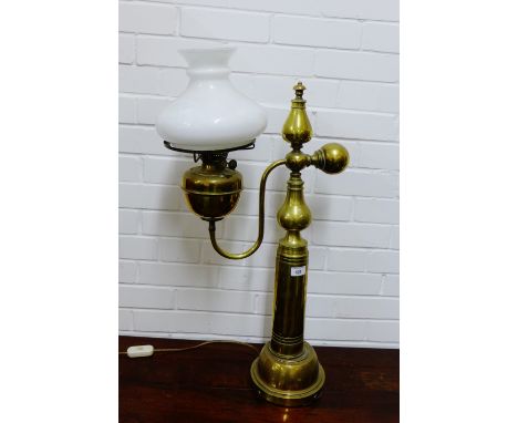 A brass floor standing lamp with white opaque glass shade, height 75cm